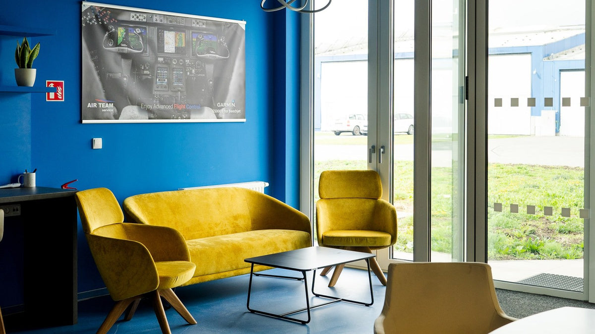 AIR TEAM office lounge — Garmin cockpit poster