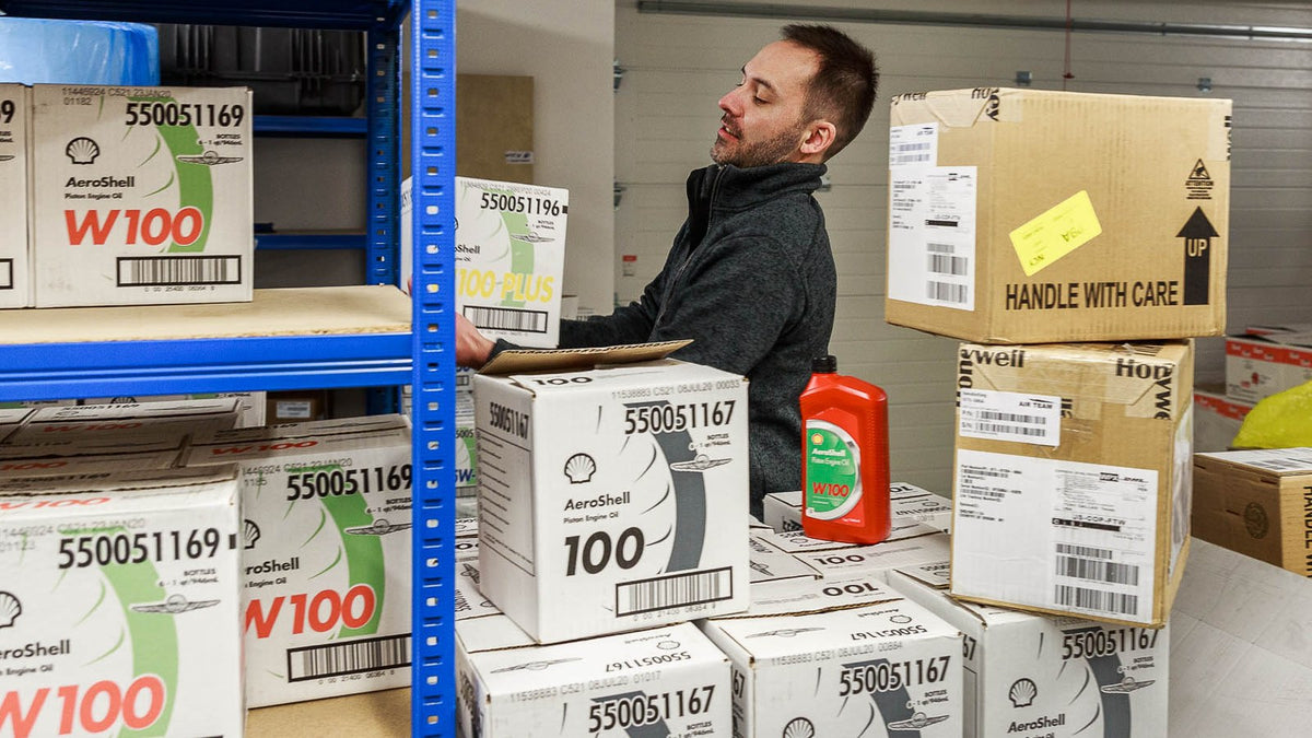AIR TEAM warehouse shelves with aircraft oils