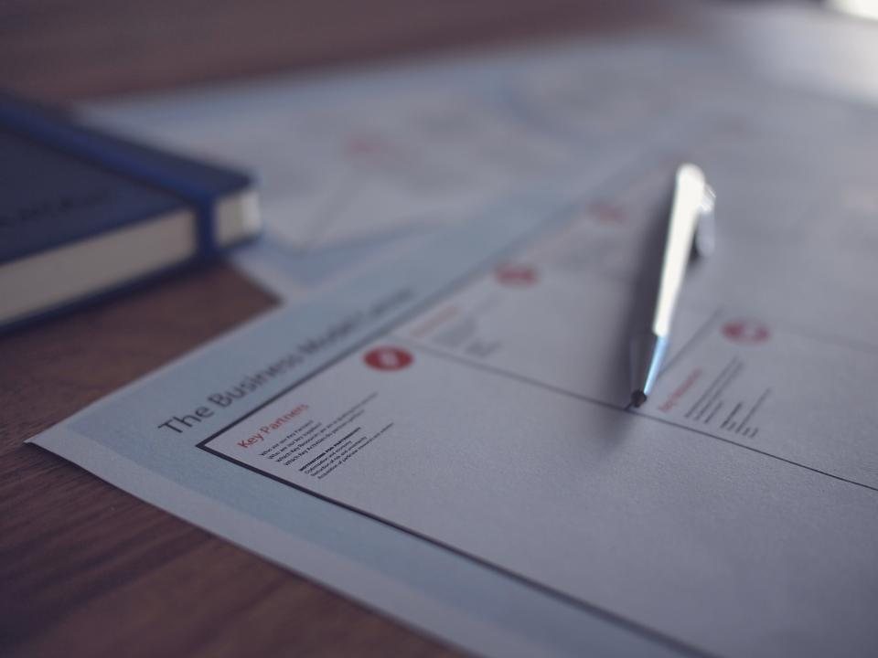 Business document and pen
